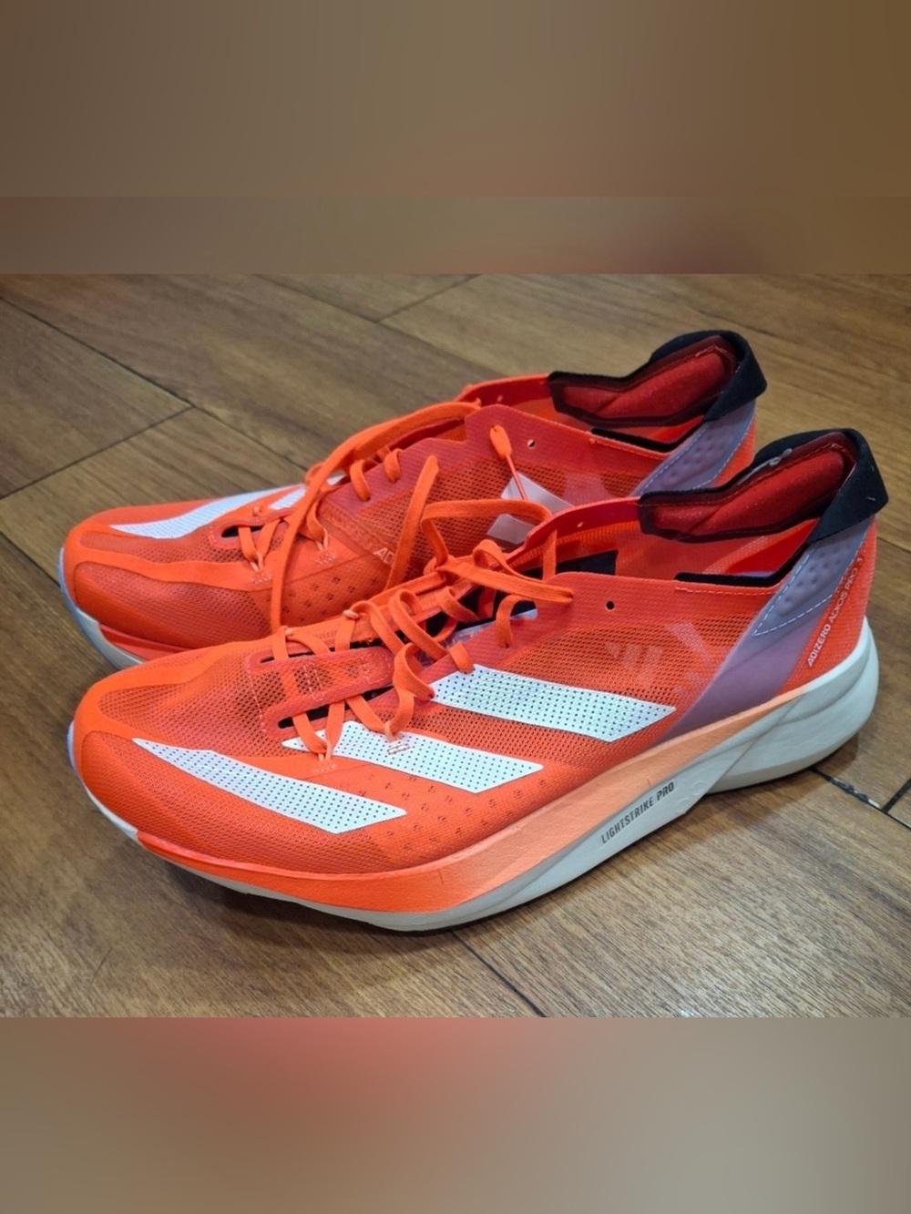adidas Men’s Orange and White Running Shoes